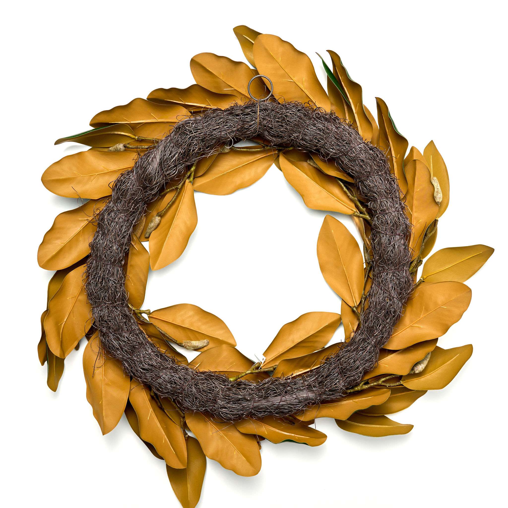 Green and gold leaf wreath on a dark wooden background