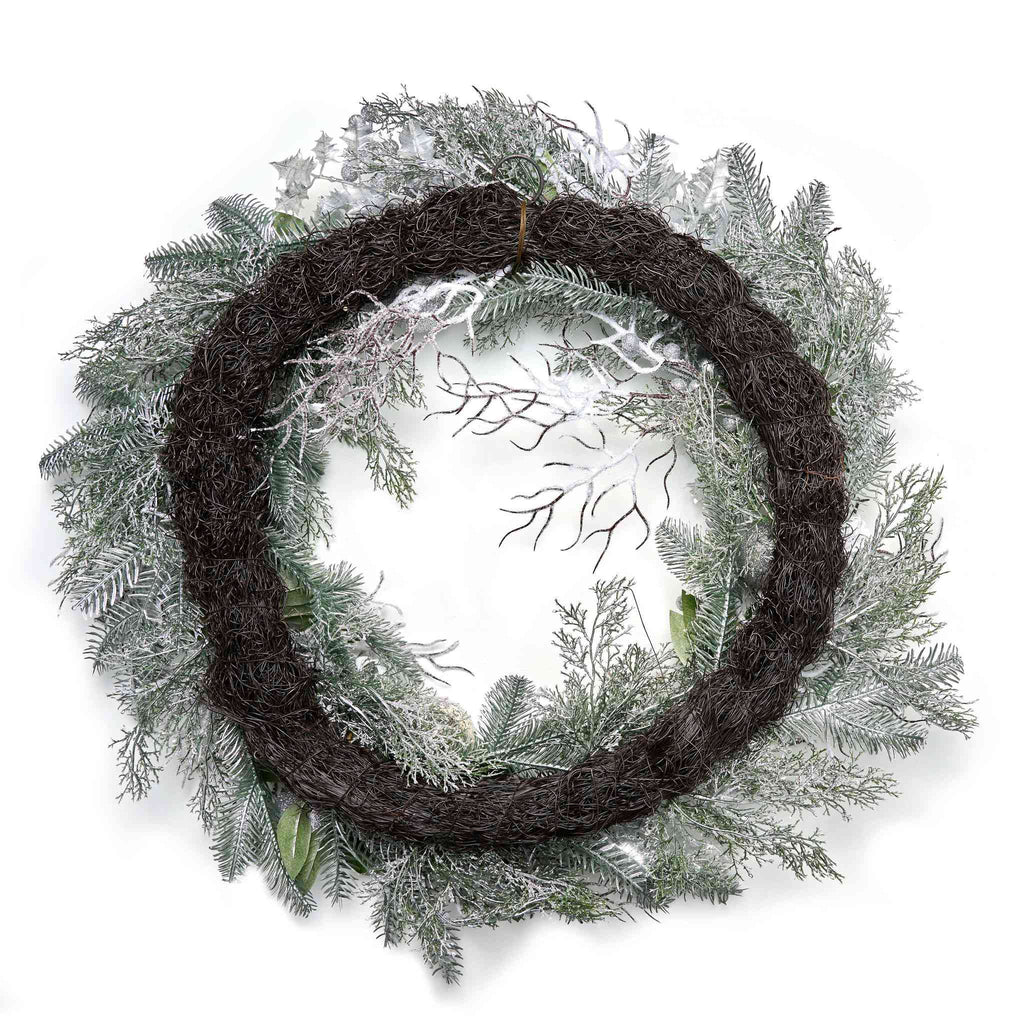 Wreath with natural elements on a white background