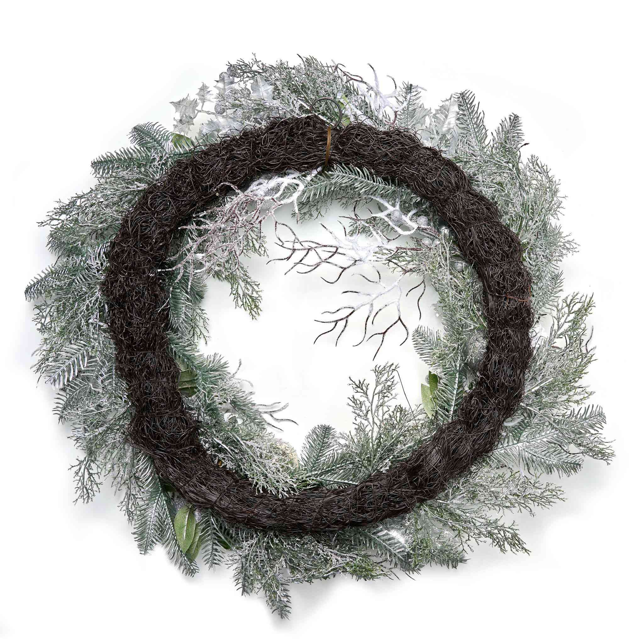 Wreath with natural elements on a white background
