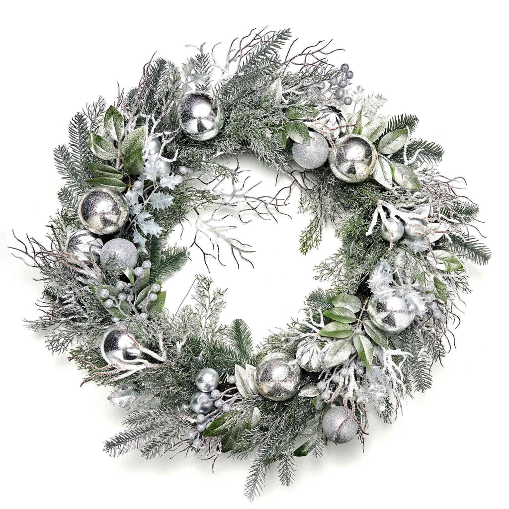 Decorative wreath with silver ornaments on a white background