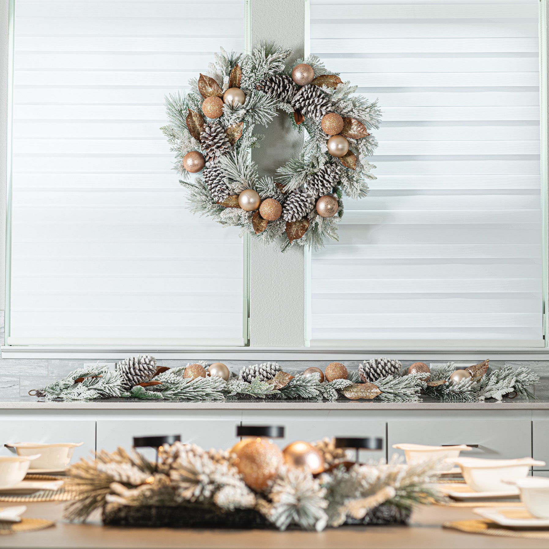 Winter white wreath with winter white garland and winter white centerpiece.